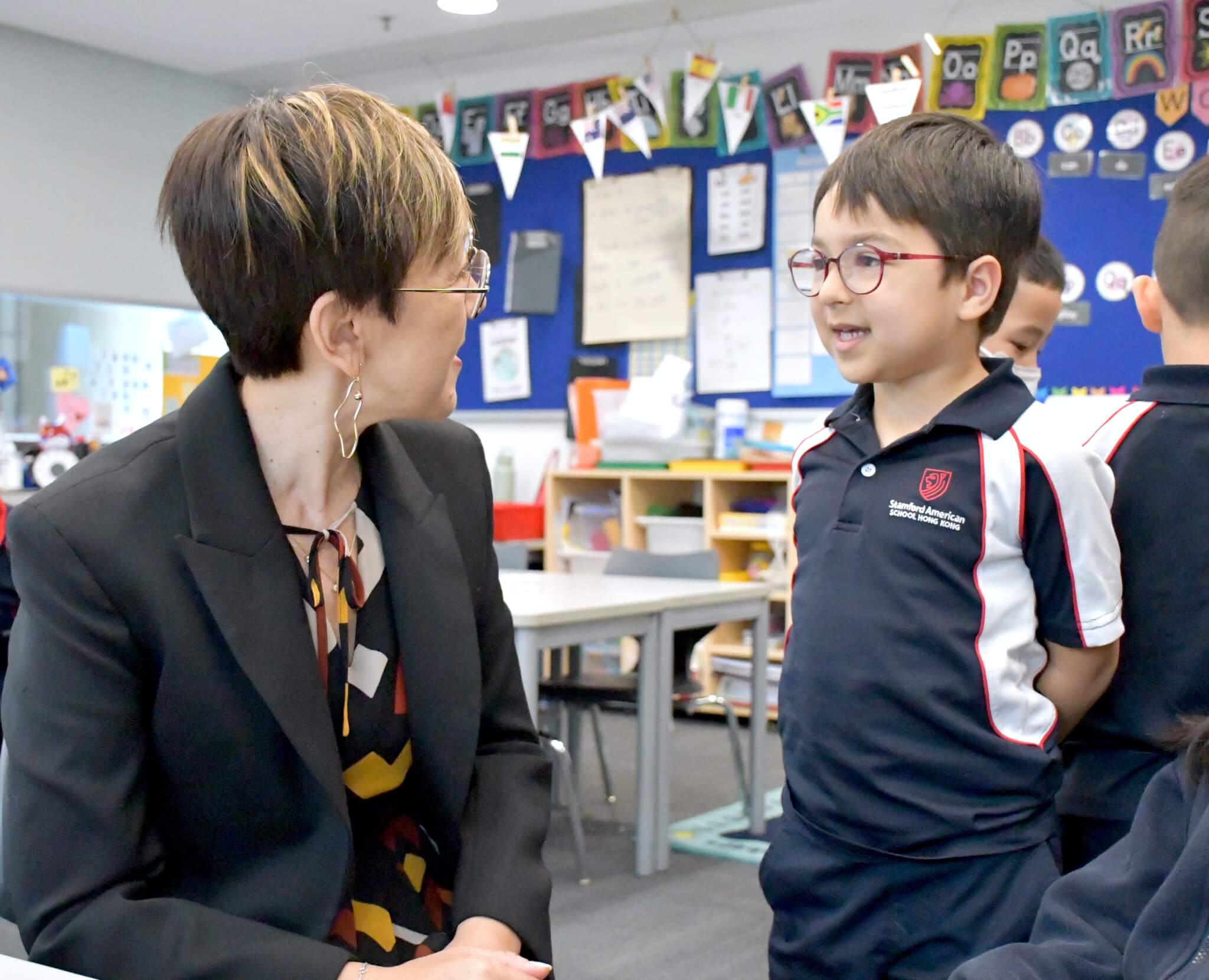 teacher talking to student