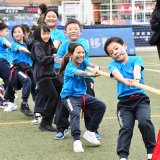 children playing tug of war